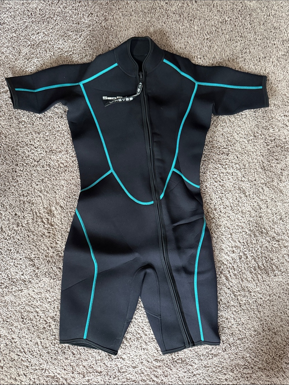 Women’s Short Sleeve Swim Rashguard Suit in Black with Teal Trim